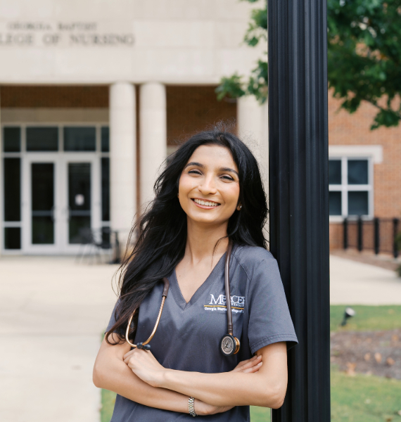 female nursing student smiling at the camera
