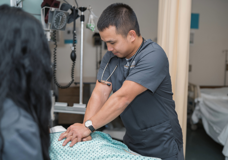 male nursing student performing cpr